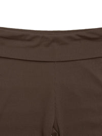 Close-up of a brown garment with a ribbed texture on a white background