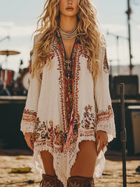 Woman wearing a bohemian-style dress with intricate patterns outdoors.
