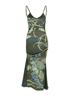 Green floral dress on a white background