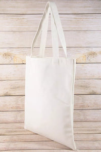 White tote bag on a wooden surface