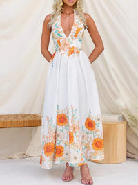 Woman wearing a floral dress with a white background