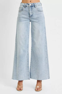Light blue wide-leg jeans on a white background