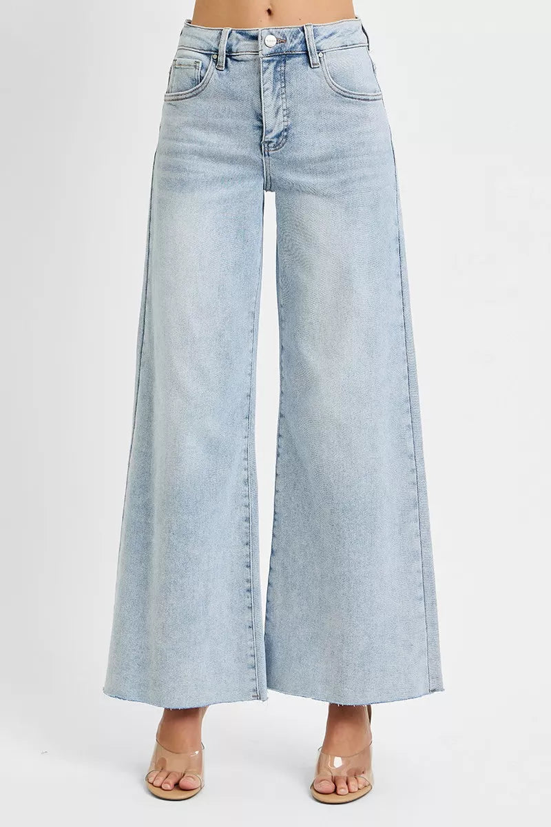 Light blue wide-leg jeans on a white background