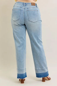 Light blue jeans with a white background