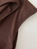 Close-up of brown fabric on a white background