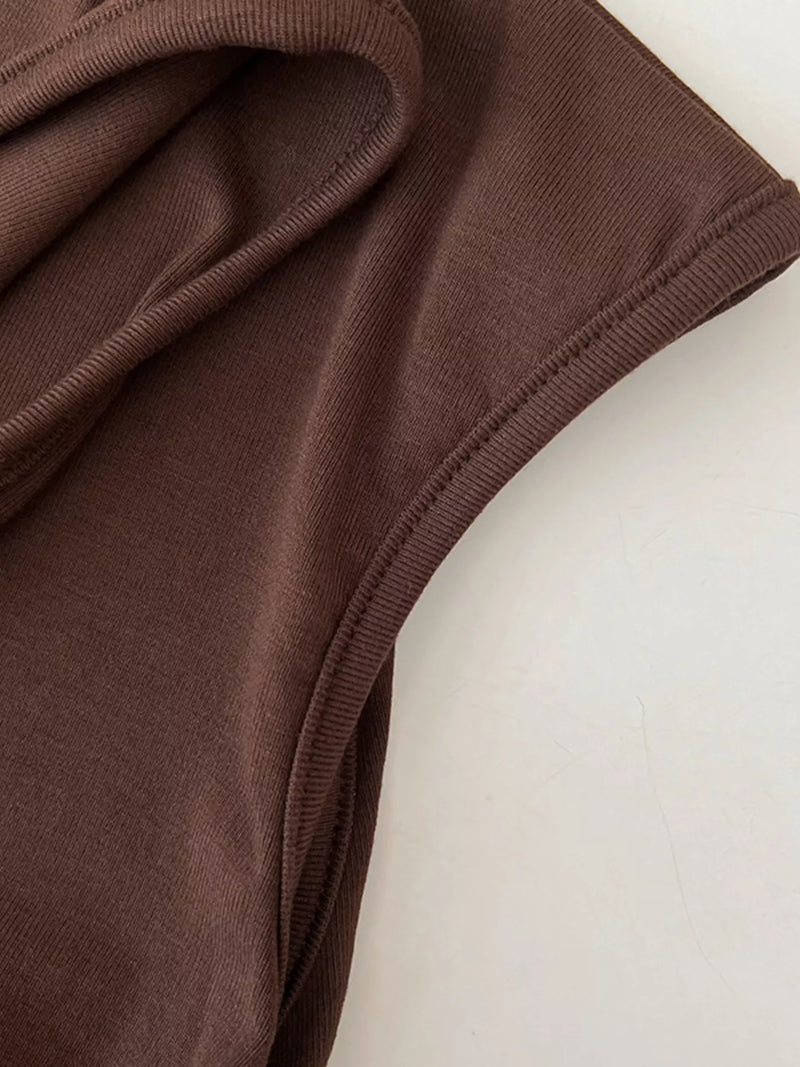 Close-up of brown fabric on a white background