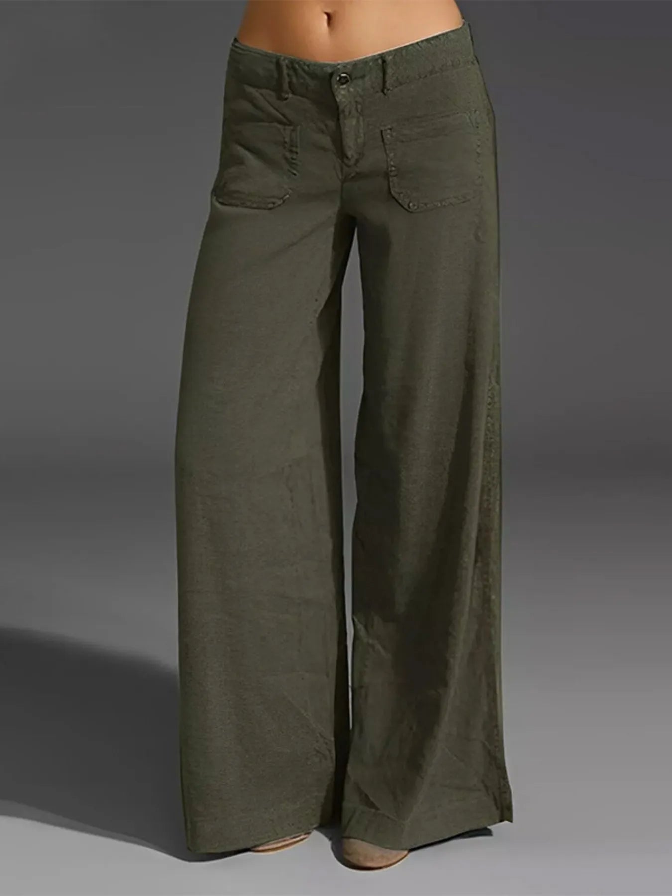 Green wide-leg pants on a gray background