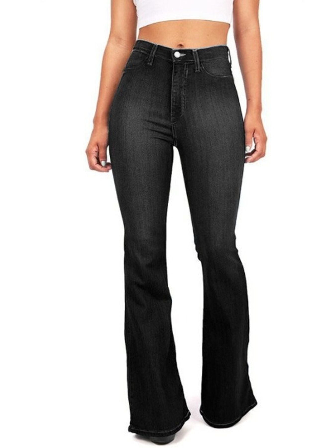 Black flared jeans worn by a person on a white background