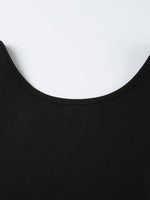 Close-up of a black garment with a white background
