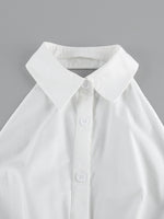 White shirt with collar and buttons on a gray background
