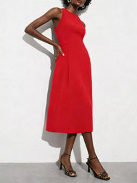 Red dress worn by a model on a white background