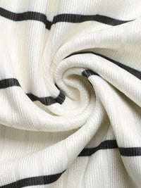 Close-up of white fabric with black stripes