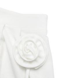 White fabric with a floral design on a white background