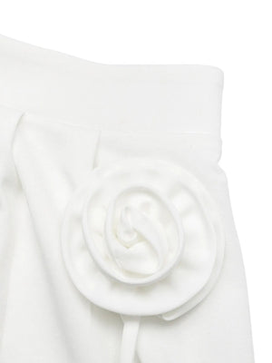 White fabric with a floral design on a white background