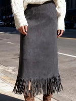 Lady on a sidewalk taking a picture in a gray High-Waisted Fringe Midi Skirt