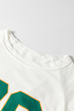 View of round neck on Number 76 Round Neck Long Sleeve Top