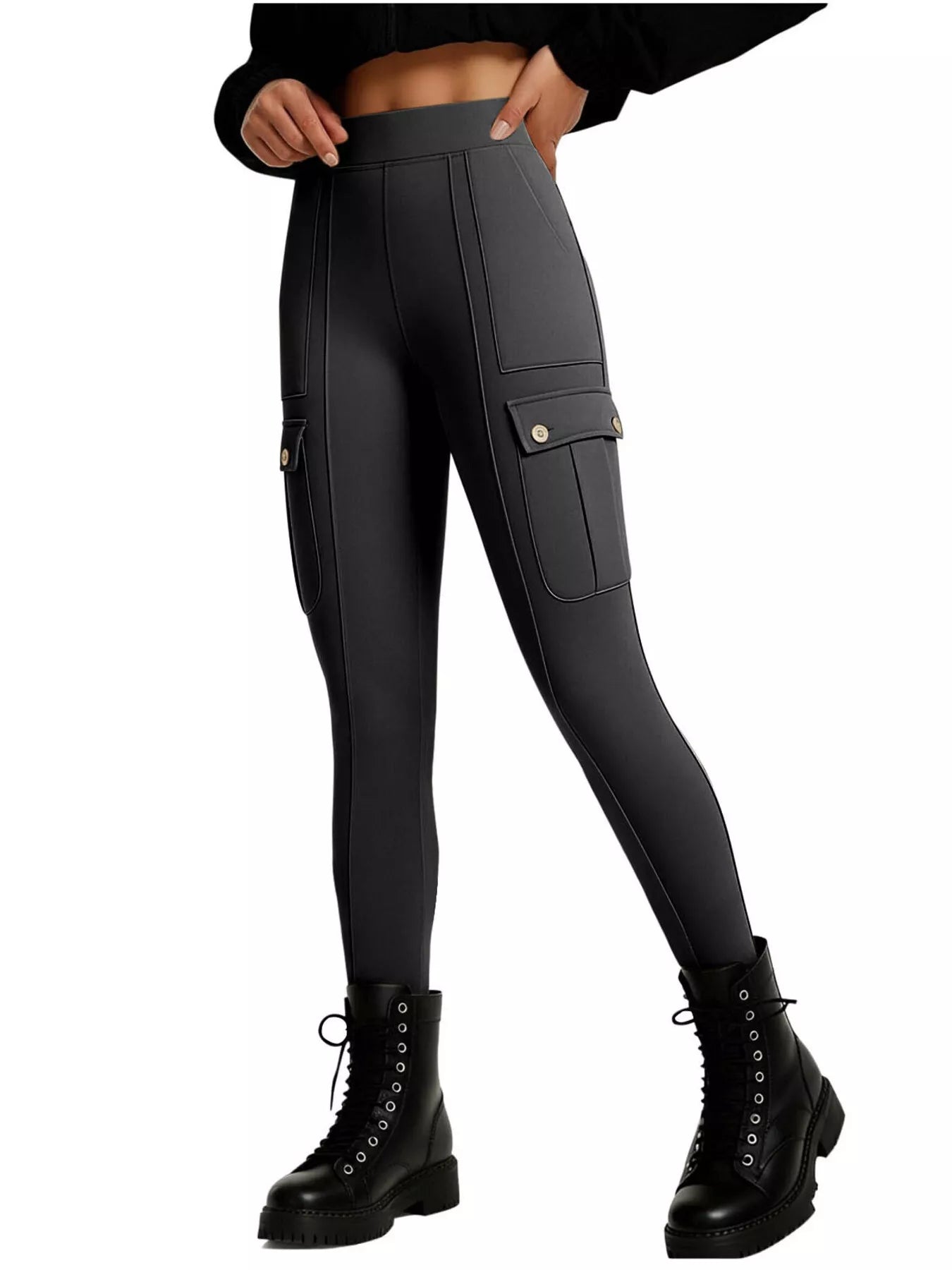 Black leggings with pocket details worn by a person on a white background