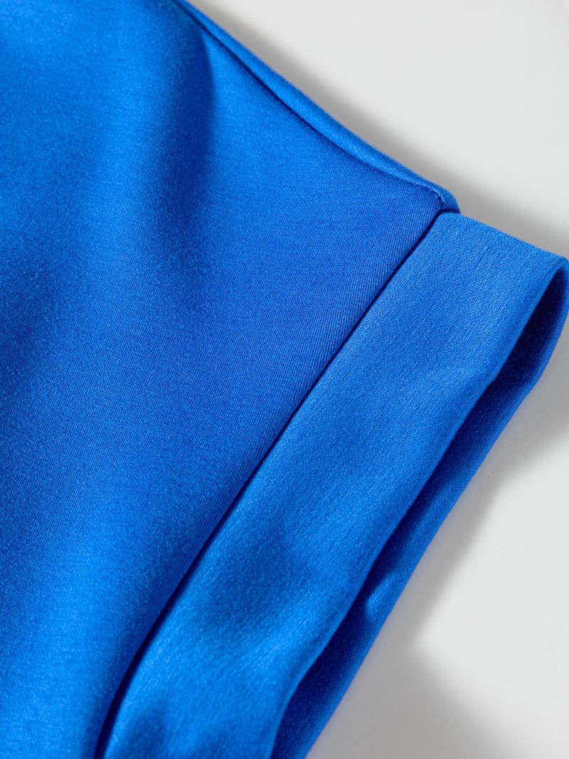 Close-up of a blue fabric with a plain background