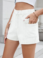 White shorts worn by a person with a blurred background
