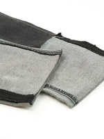 Gray fabric with black trim on a white background