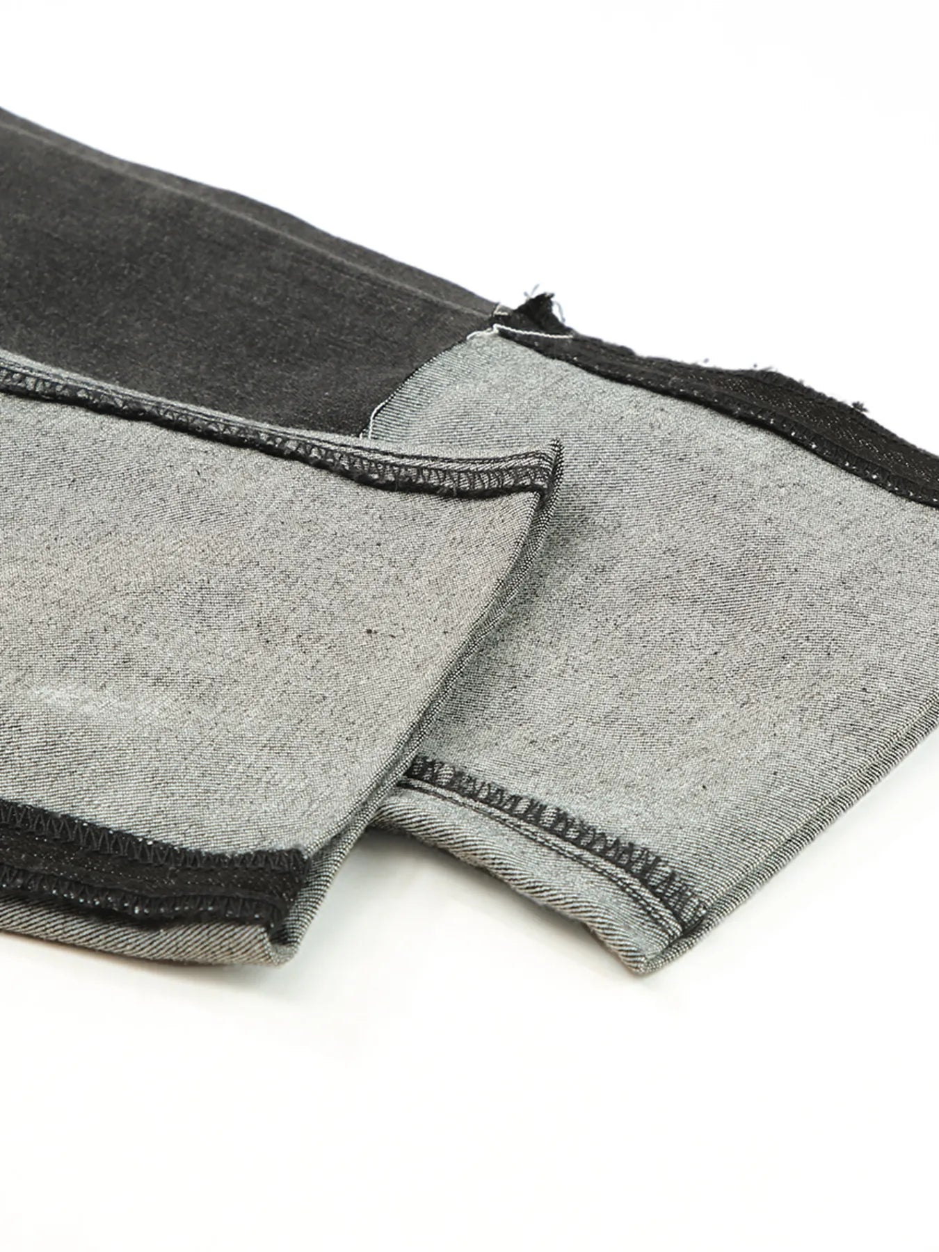 Gray fabric with black trim on a white background