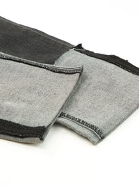 Gray fabric with black trim on a white background