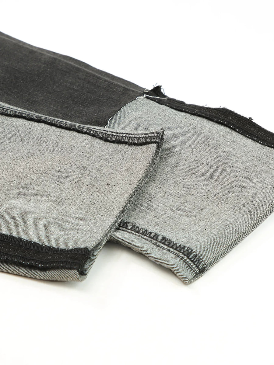 Gray fabric with black trim on a white background