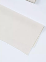 Beige fabric on a white background