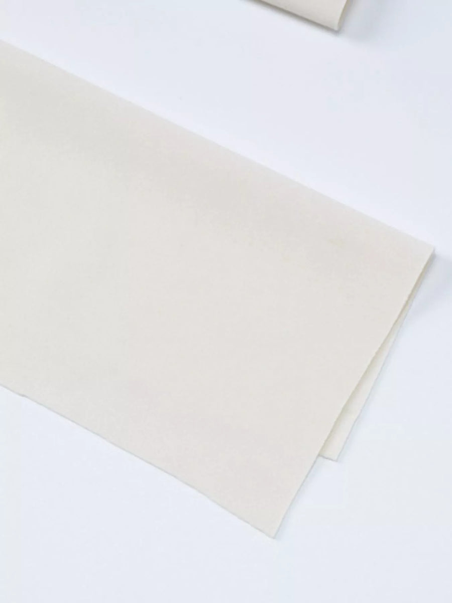 Beige fabric on a white background