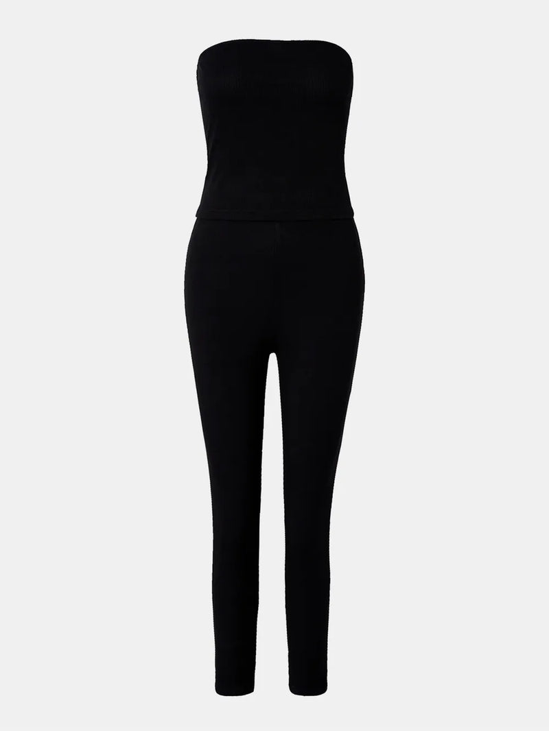 Black strapless jumpsuit on a white background