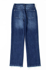 Back view of blue jeans on a white background