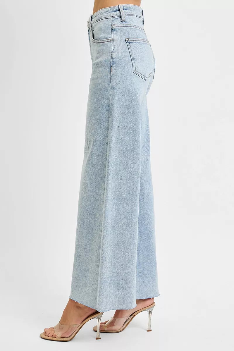 Light blue wide-leg jeans on a white background