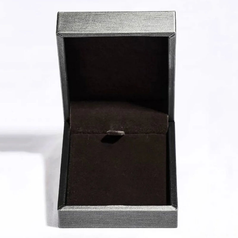 Black jewelry box with a silver lid on a white background