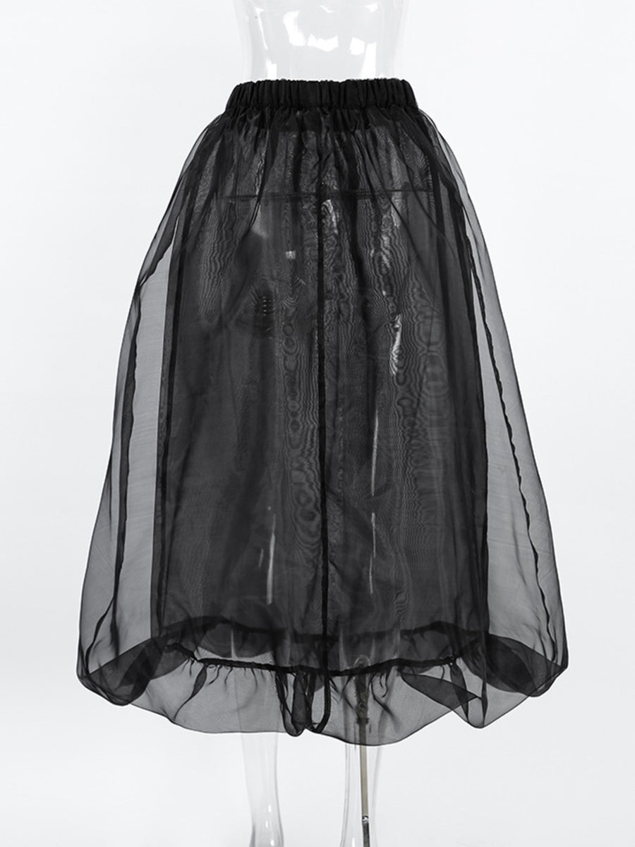 Black sheer skirt on a white background