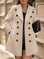 A woman wearing a off white Double-Breasted Wool Blend Overcoat