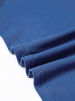 Close-up of blue fabric with a white background