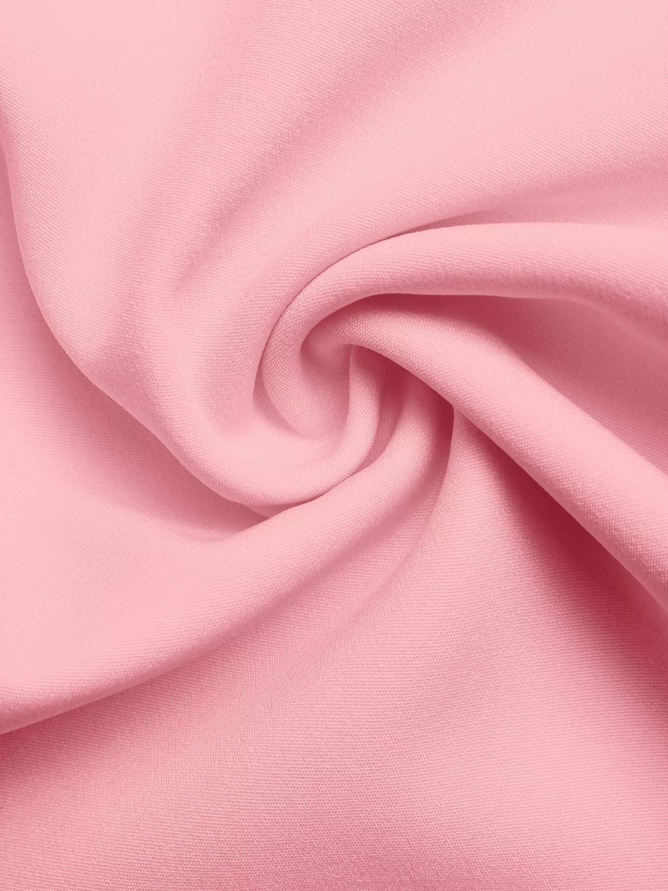 Close-up of pink fabric with a swirl pattern