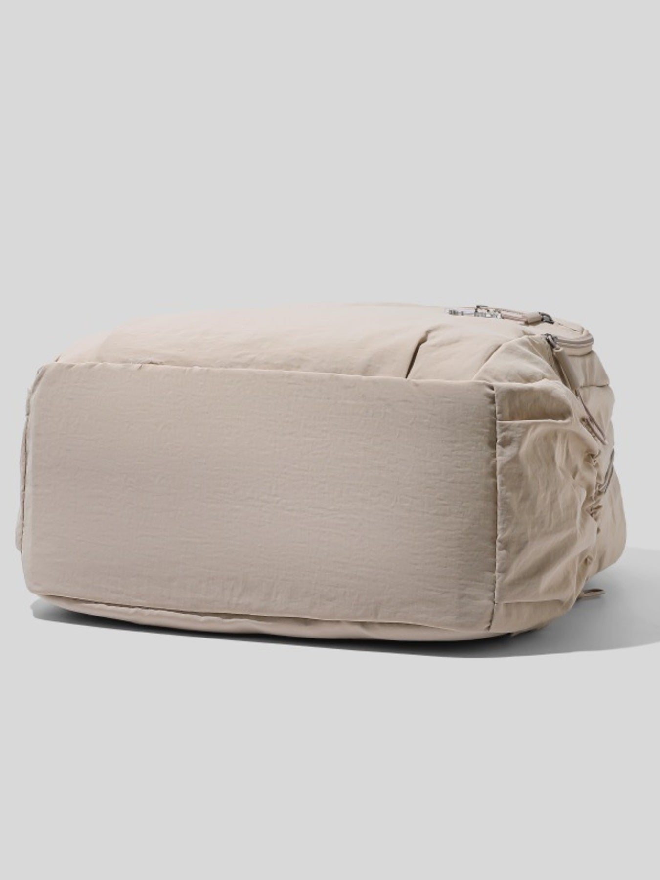 Beige pouch on a light gray background