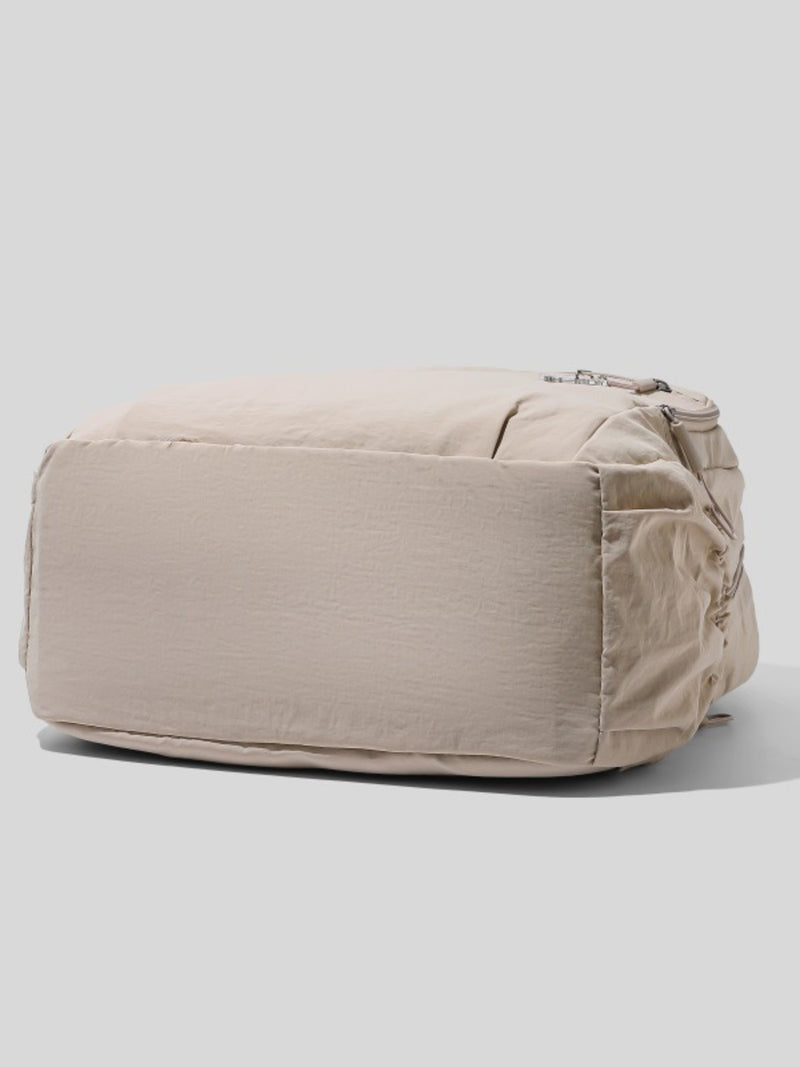 Beige pouch on a light gray background