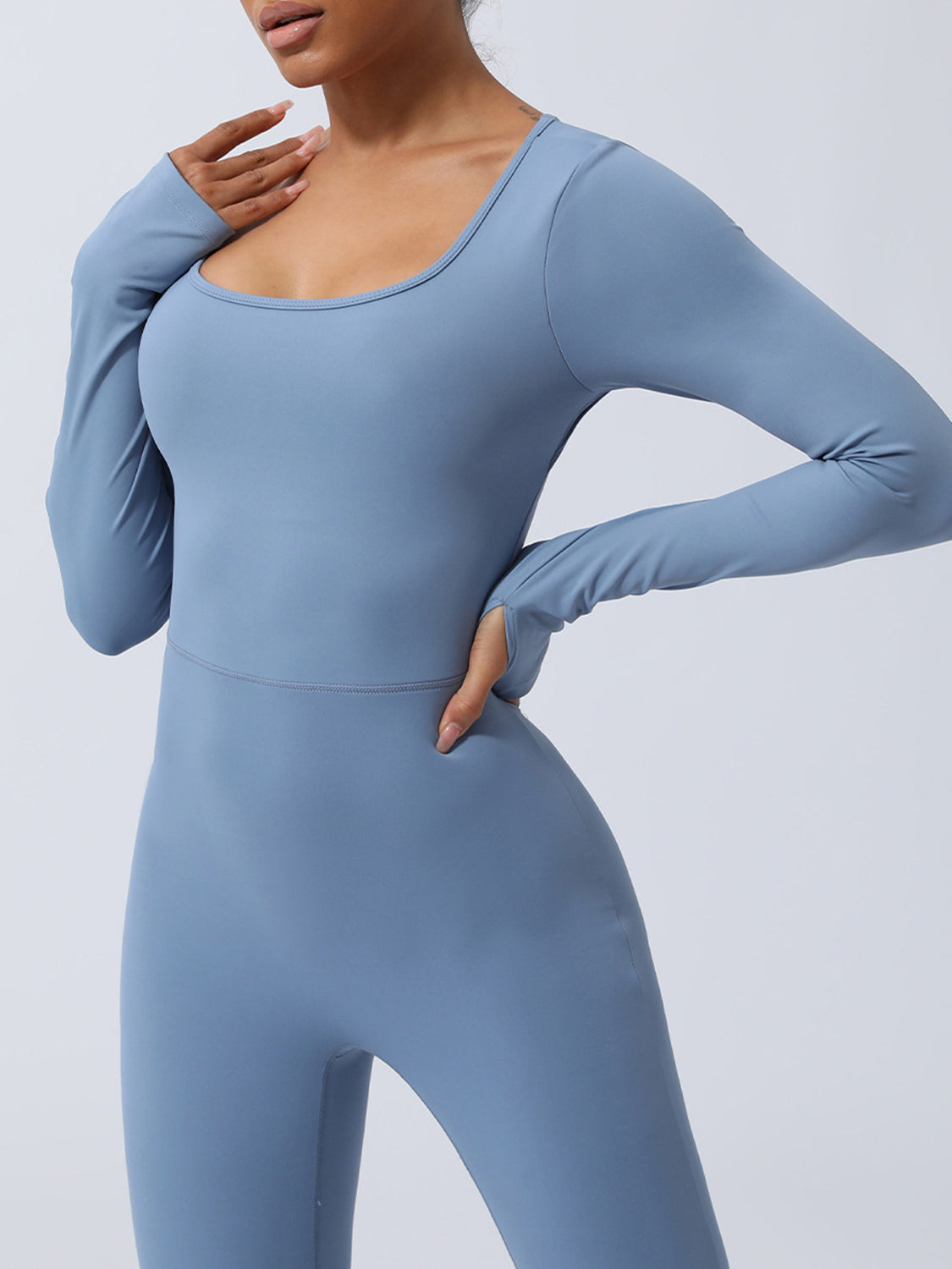 Full view of blue Twisted Backless Long Sleeve Jumpsuit