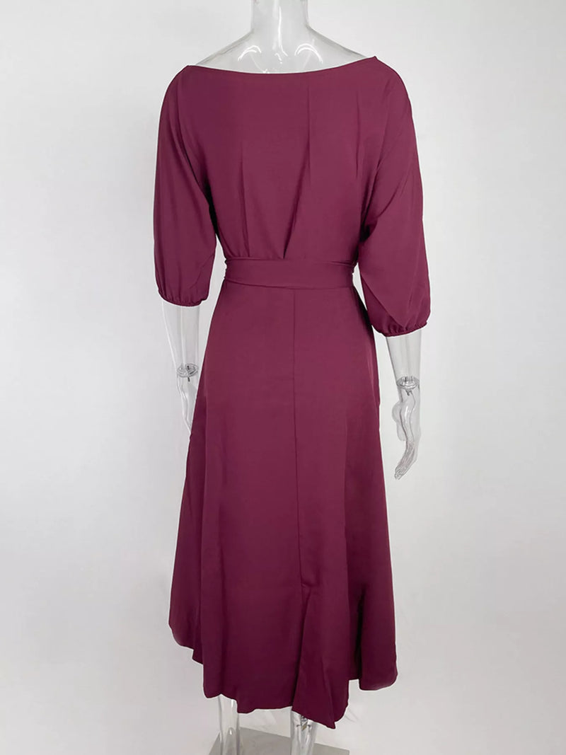 Mauve dress on a mannequin against a white background