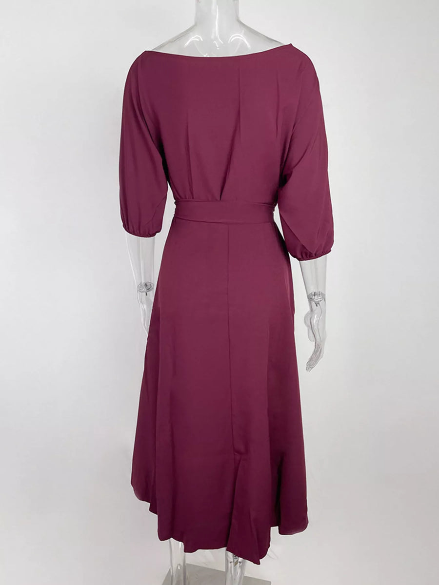 Mauve dress on a mannequin against a white background