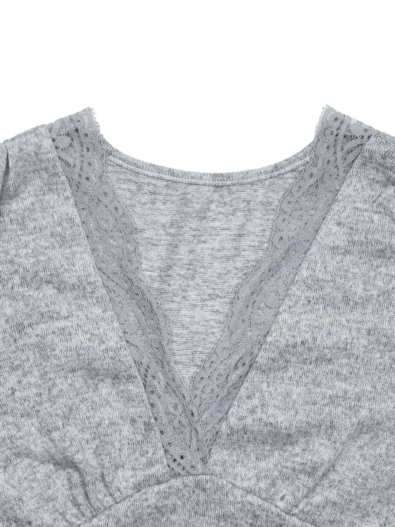 Gray sweater with lace trim on a white background