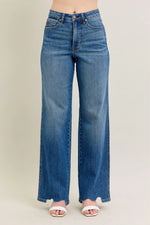 Blue jeans on a plain background