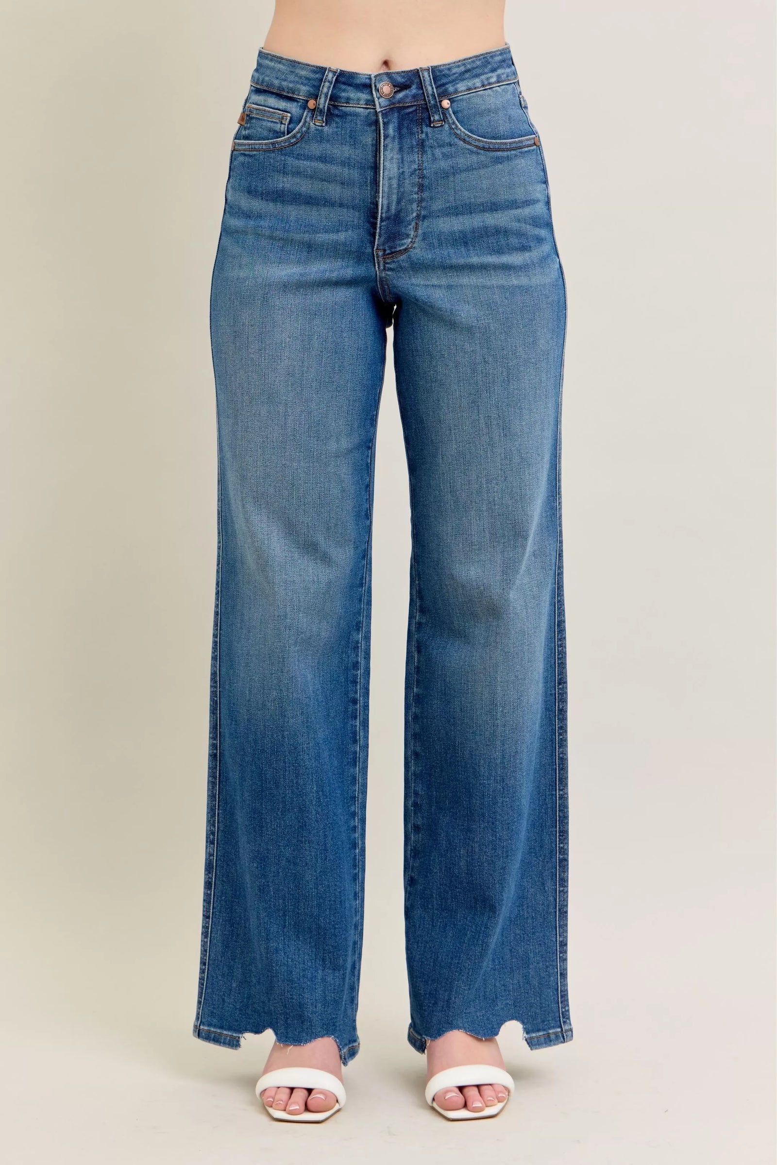 Blue jeans on a plain background