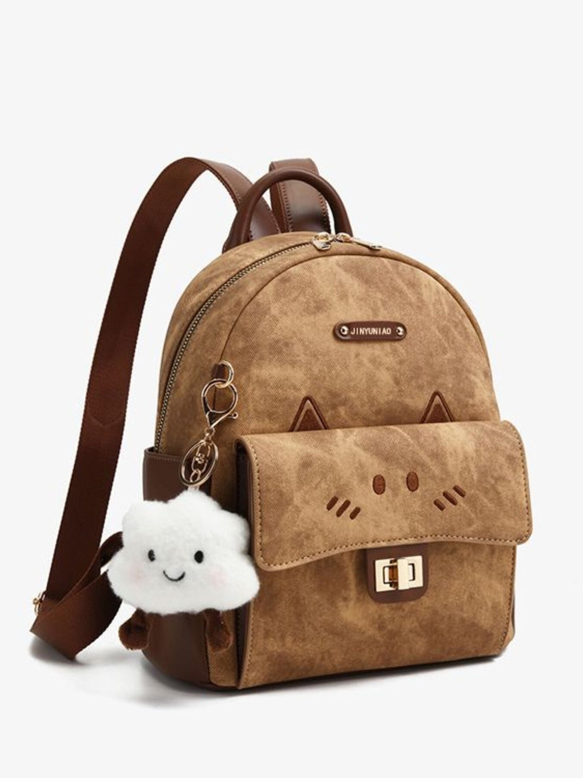 Brown backpack with a fluffy cloud charm on a light gray background