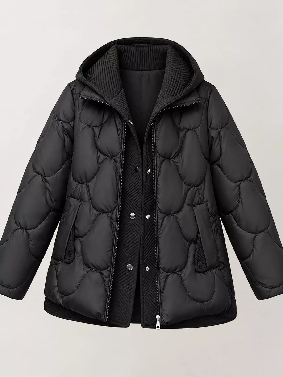 A black quilted puffer jacket with a hood, shown on a light gray background. The jacket features a wavy quilted pattern, a ribbed knit hood, a front zipper and snap button closure, and side pockets.