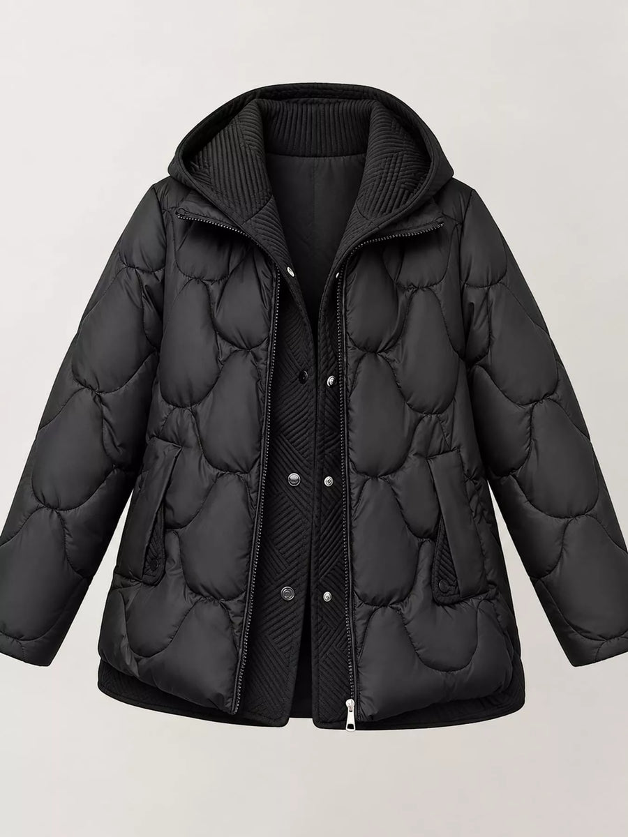 A black quilted puffer jacket with a hood, shown on a light gray background. The jacket features a wavy quilted pattern, a ribbed knit hood, a front zipper and snap button closure, and side pockets.