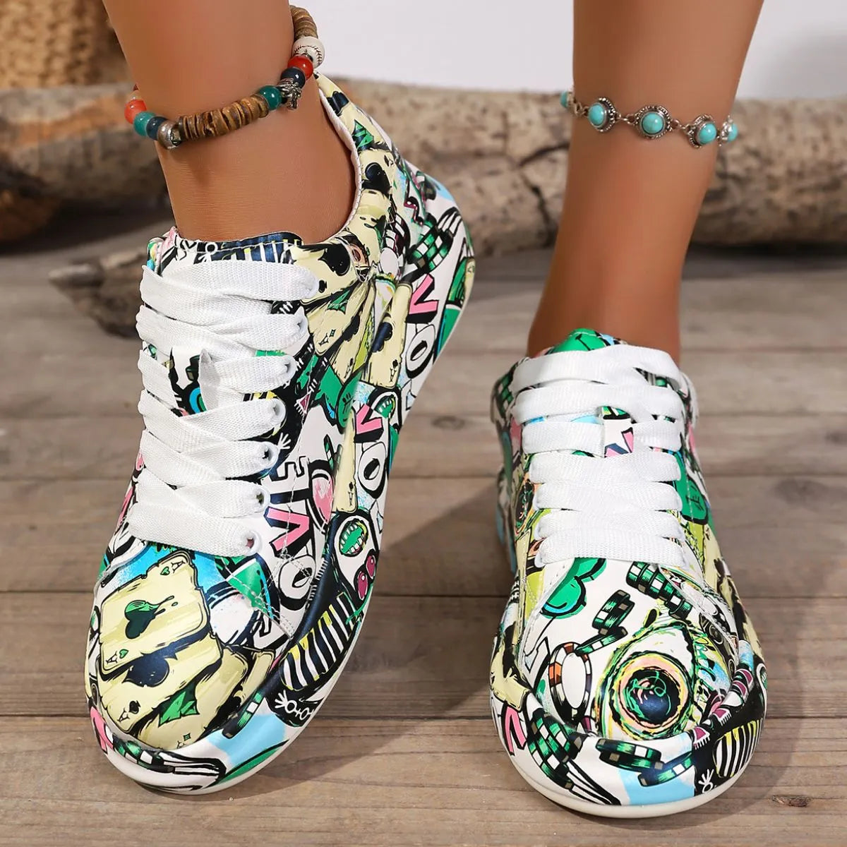Colorful patterned sneakers on a wooden floor
