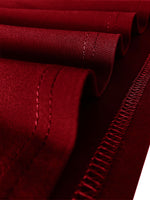 Close-up of red fabric with stitching details